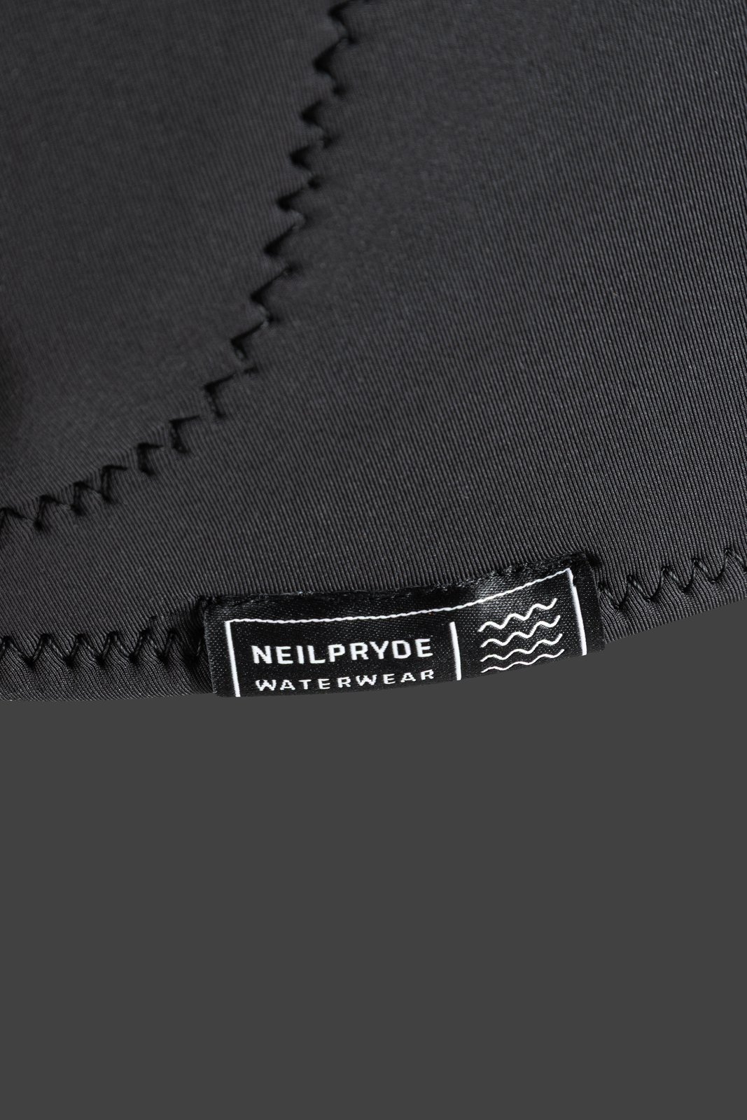 NeilPryde Combat Foil Impact SZ 2026 védőmellény részlete és márkajelzése