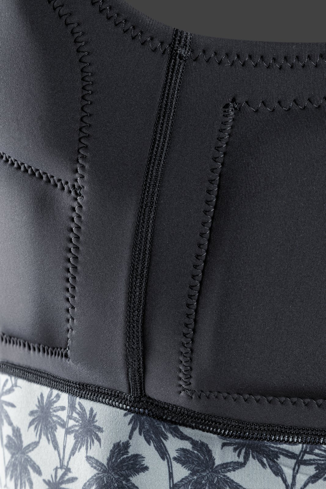 Storm Impact HS FZ 2026 oldalra cipzáras impact mellény fekete pálmafás mintás alsó panellel és erősített varrásokkal