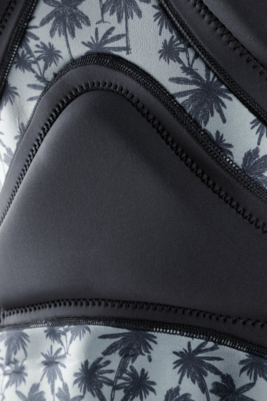 Storm Impact HS FZ 2026 ütésvédő mellény részlet pálmafás mintázattal és varrással