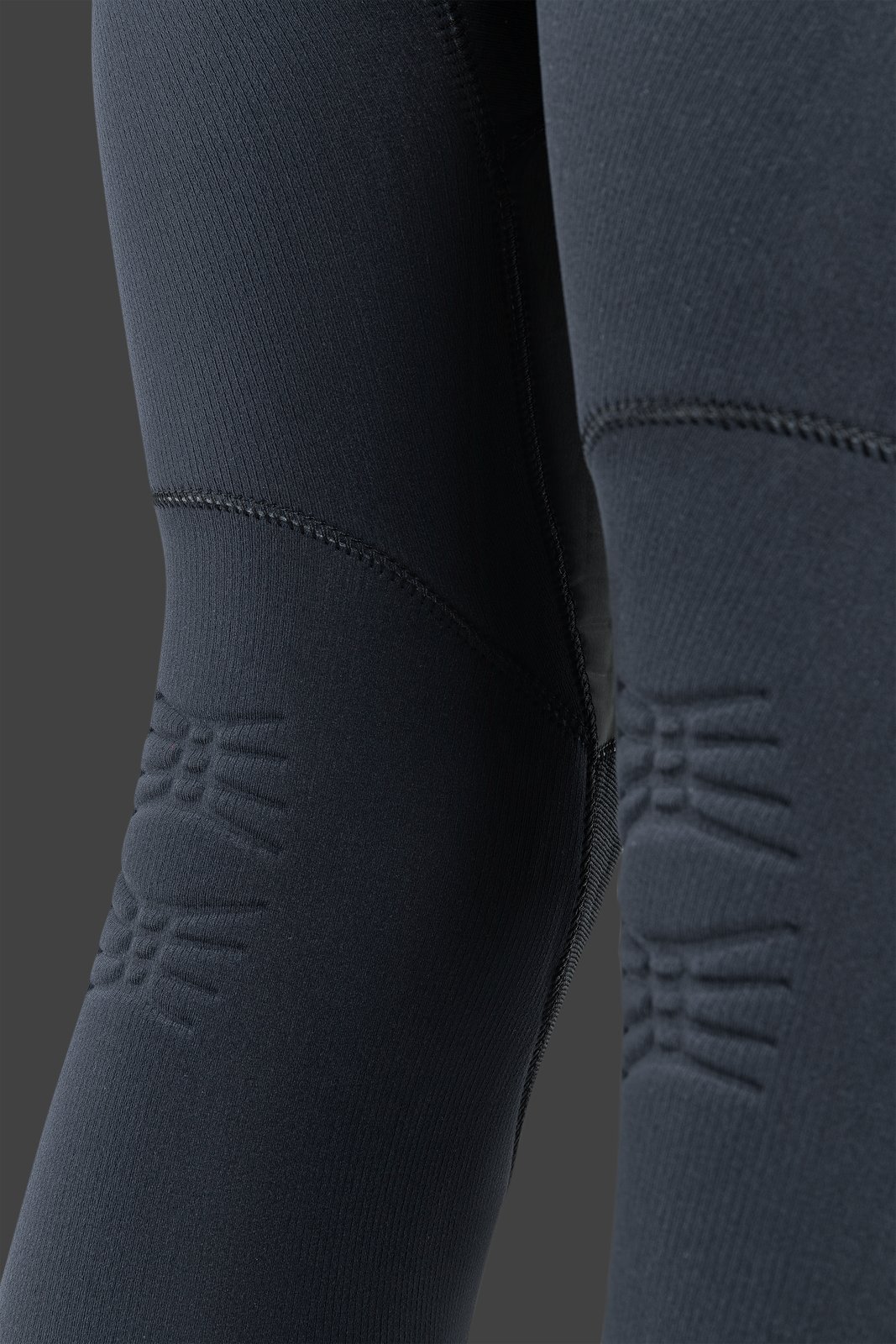 NeilPryde Combat 6/5 GBS téli szörfruha részlete G3 Armor Skin anyaggal és térderősítéssel