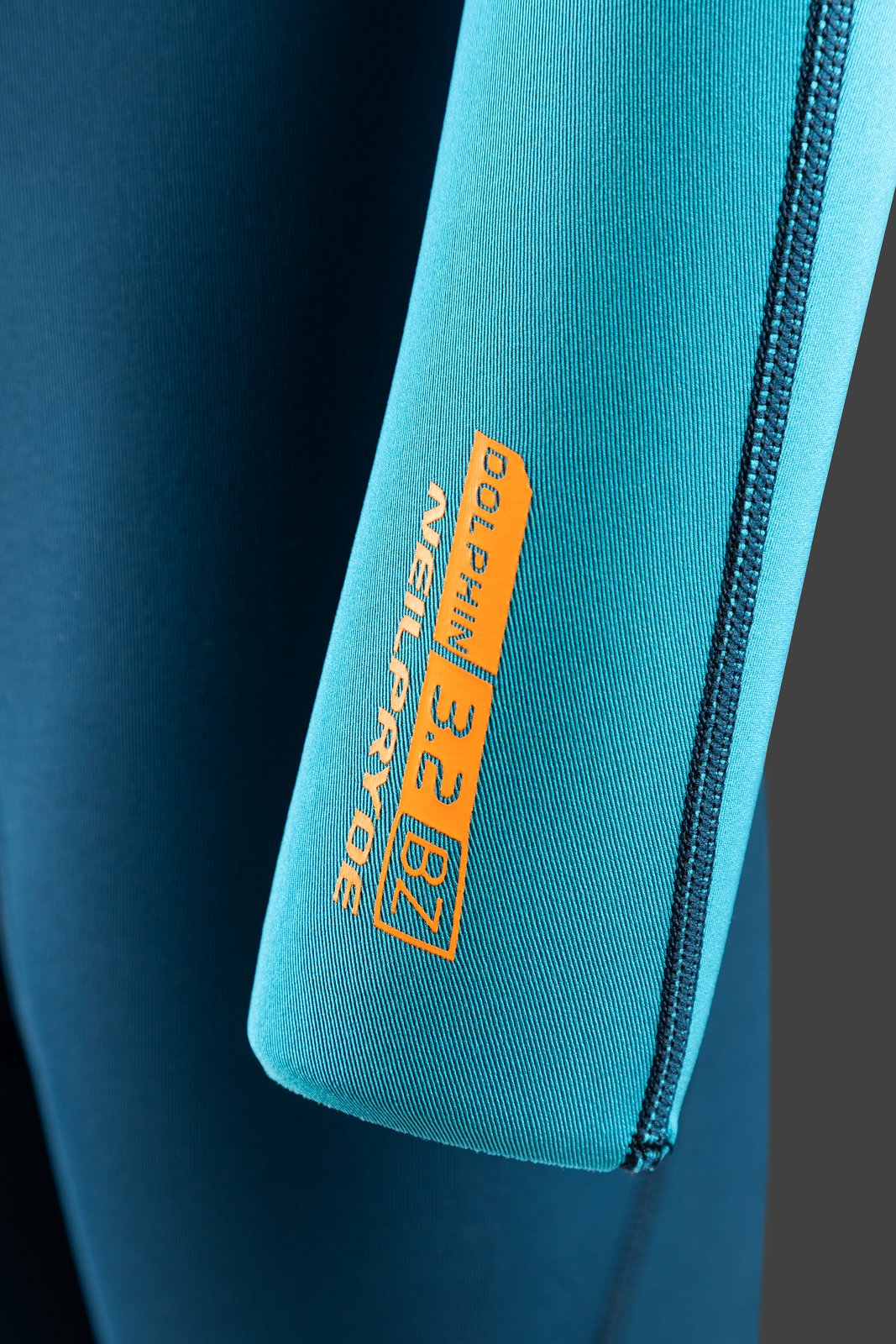 NeilPryde Dolphin Youth 3/2 GBS BZ neoprén ruha ujjrész narancssárga felirattal